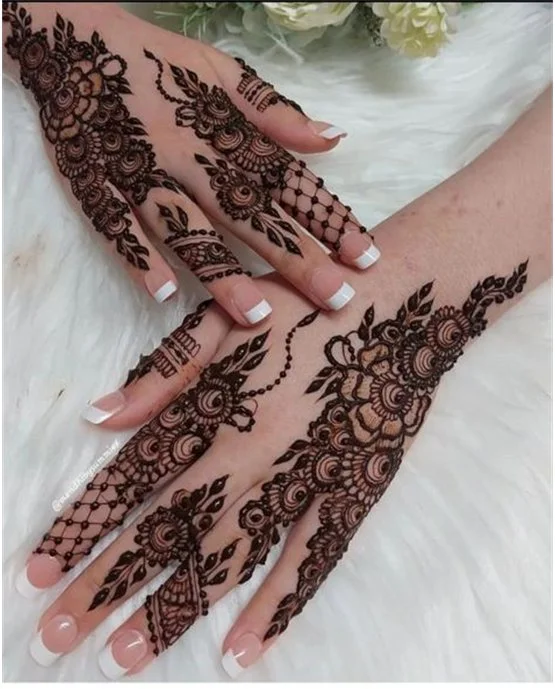 Pretty Cascade With Tile Featuring Back Hand Mehndi Design